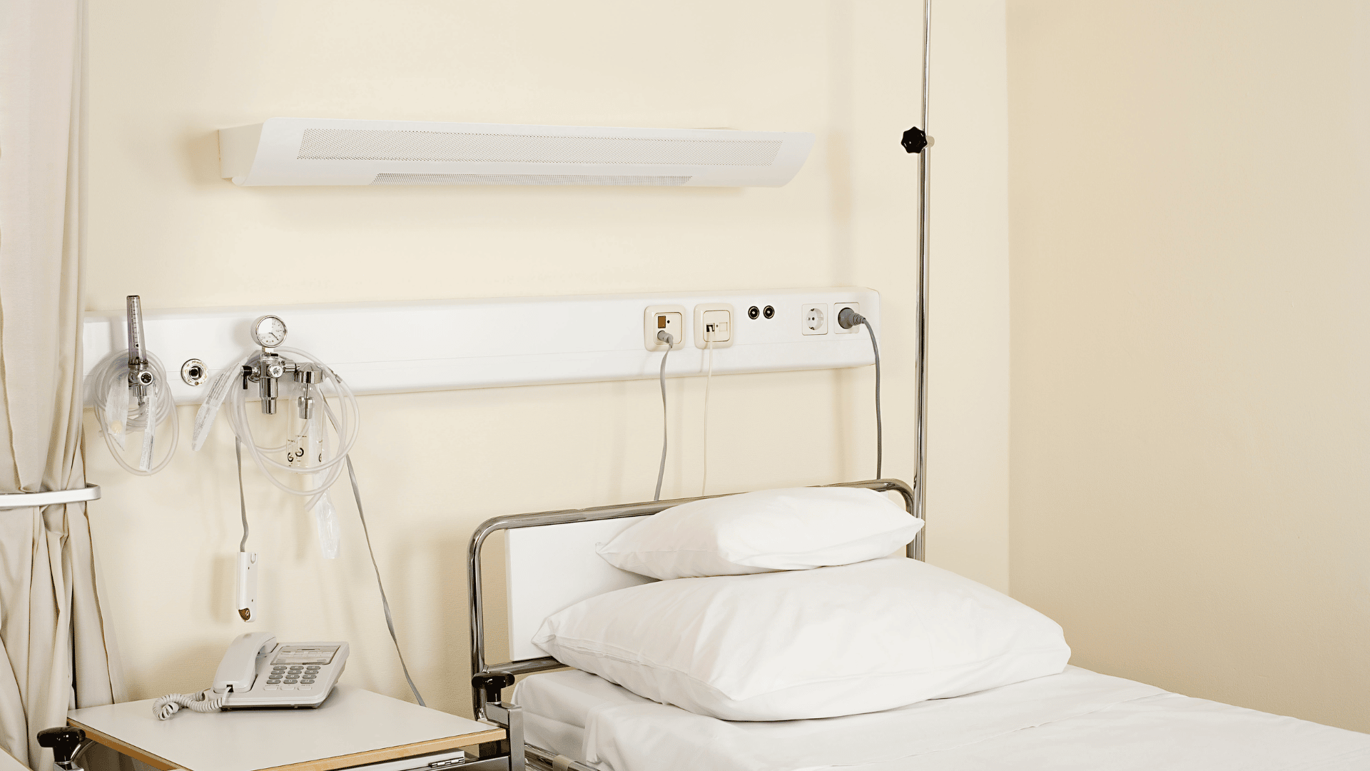 Hospital room with bed and equipment. Enduring Power of Attorney and Enduring Guardianship.